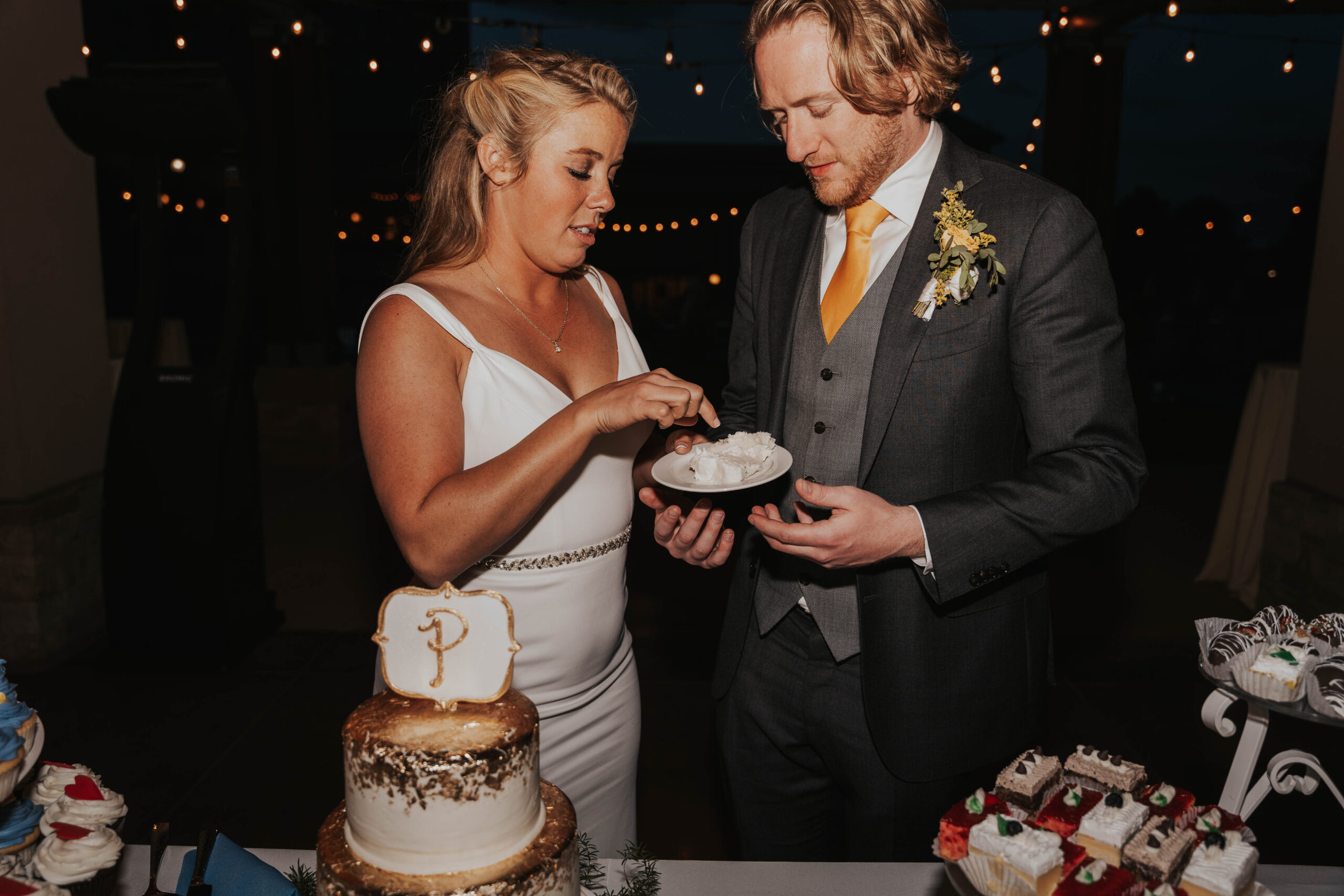 Bride and Groom Cut The Cake