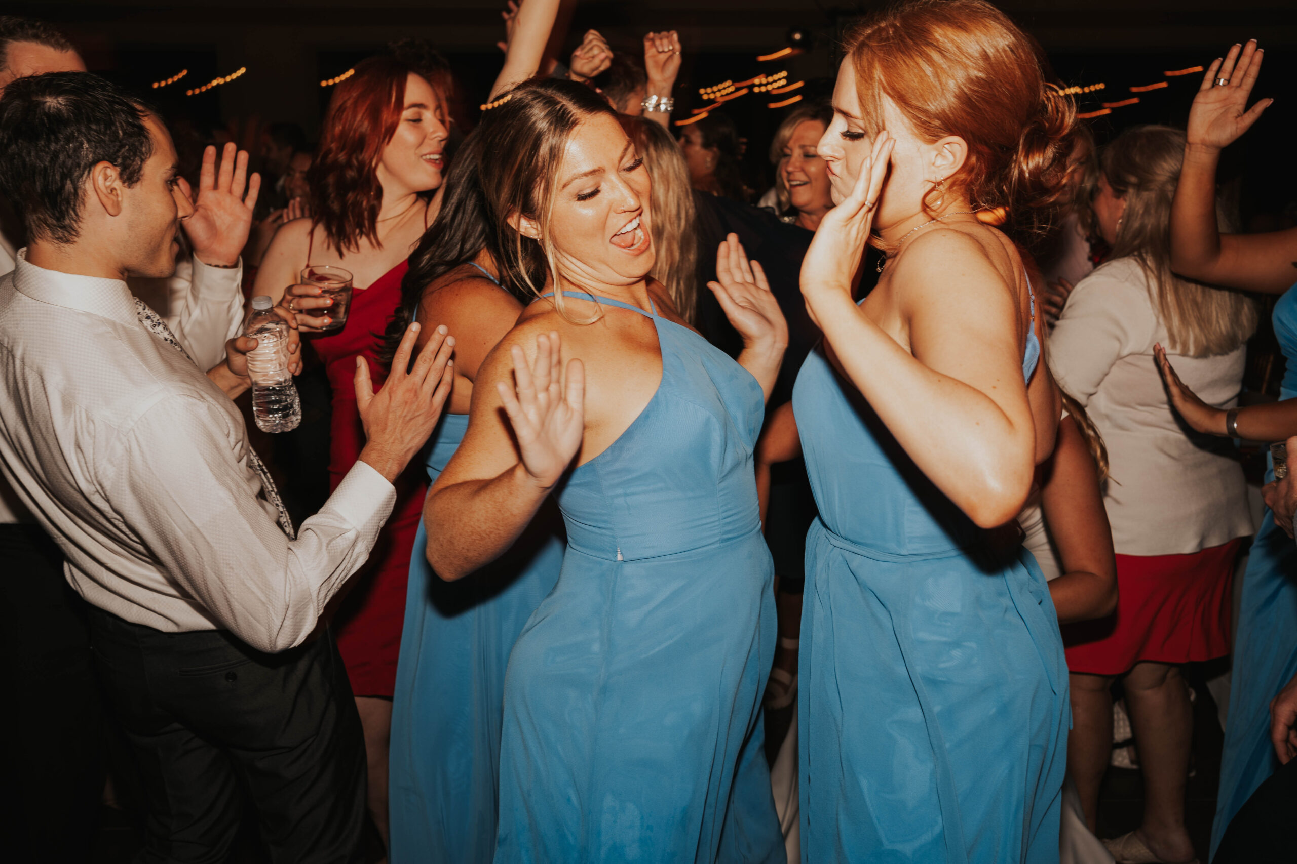 Bridesmaids Dancing At Wedding Reception